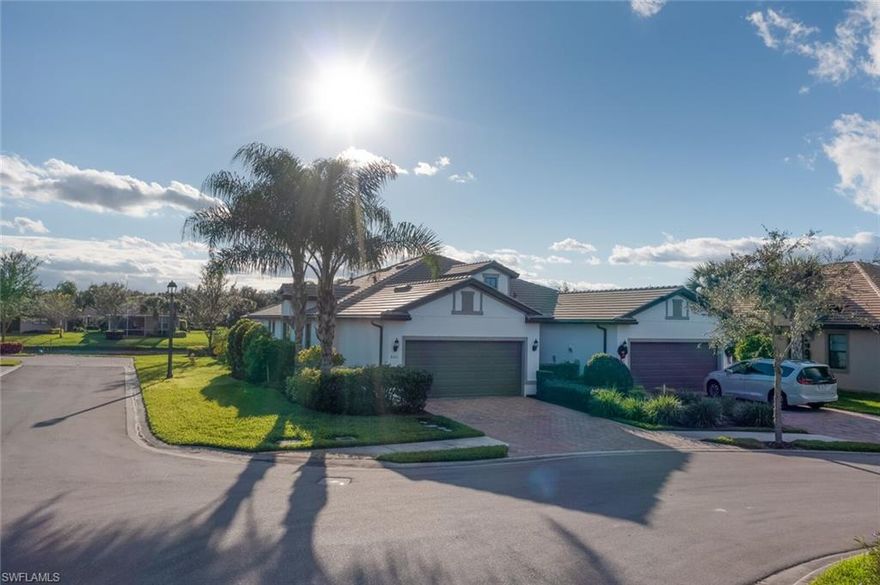 Located on an abundant corner lot, this villa screams WOW in every direction. Upon entry you are welcomed with a light, bright and airy open concept floor-plan. Interior features include oversized tile throughout, custom light fixtures and wall-coverings. In the kitchen you will find under cabinet lighting, stainless steel appliances and a perfectly sized pantry. Interior laundry has extra cabinetry and laundry tub. This home also features a split bedroom plan and the ability the close off the secondary bed and bath for your guests complete privacy. The generously sized owners suite sits pool adjacent and features dual sinks, oversized shower and a large walk in closet. Just off the living/dining area you'll find a custom pool/spa sitting on a gorgeous water view. Every available inch of this corner lot was used for this custom entertaining area. Pools/spas this size are rarely found on a villa. Add to the list of over $100000 in upgrades and customization, your new home also features integrated surround sound indoors and out, electric shutters for security and so much more! Truly a WOW!
