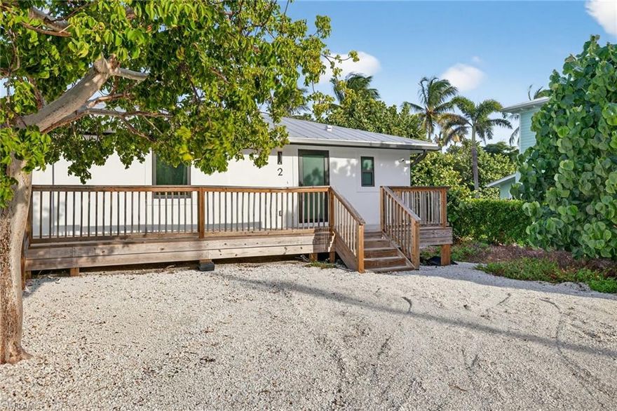 Welcome to a rare opportunity to own a fully renovated coastal duplex in the heart of Sanibel, ideally located in one of the island’s most desirable areas. Just moments from the iconic Sanibel Lighthouse, this property offers unmatched proximity to pristine beaches, boutique shopping, and island dining.

This exceptional offering includes two beautifully updated residences, thoughtfully designed for both personal use and income potential. The property features a 3-bedroom, 2-bath unit and a 1-bedroom, 1-bath unit, both fully renovated with modern finishes while preserving the charm of coastal living.

Each unit showcases completely updated interiors and exteriors, including new kitchens, updated bathrooms, and stylish furnishings throughout, creating a true turnkey experience.

Outdoor living is elevated with a brand-new wood deck and screened-in porch, perfect for relaxing or entertaining in a private island setting.

Ideally positioned near the Sanibel Causeway for convenient on-and-off island access, the property is also close to a public boat ramp and offers ample parking for multiple vehicles and watercraft.

Additional highlights include: Fully furnished and move-in ready. In-unit washer and dryer. Pet-friendly accommodations. Flexible rental potential for both units. Ideal for investment, seasonal use, or multigenerational living.

This is a rare opportunity to own a versatile, income-producing property in a premier Sanibel location.