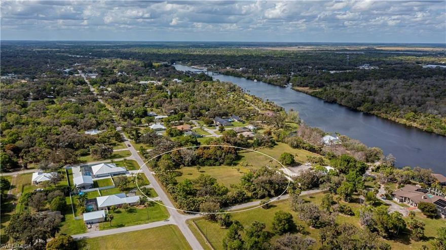 Build your new home on this 1+ acre property located within the City of LaBelle. This lot offers plenty of privacy and space while also being close to restaurants and shopping, as well as being only 30 minutes from Ft. Myers. This property also has frontage on two roads, allowing for access from multiple areas and plenty of room to build without having to remove any of the beautiful oak trees.