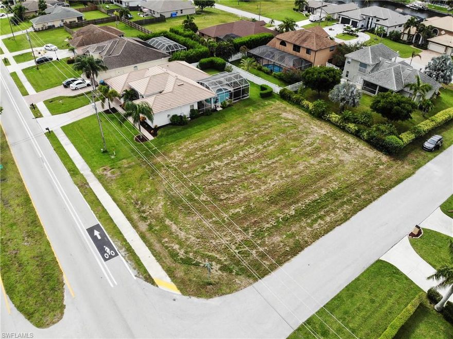 Build your dream home on this perfect Cape Coral lot. This corner lot is located at the end of Cape Coral Pky in a quiet location. This is a great opportunity to build in the beautiful SW Cape, close to Cape Harbour as well as restaurants and shopping. Don't wait too long, this lot will sell quick!
