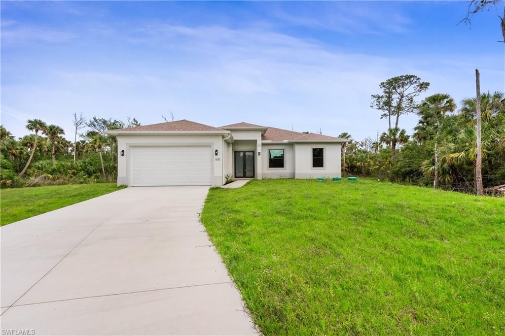 Photo of 630 Loleta CT, LEHIGH ACRES, FL 33972 (MLS # 226005159)