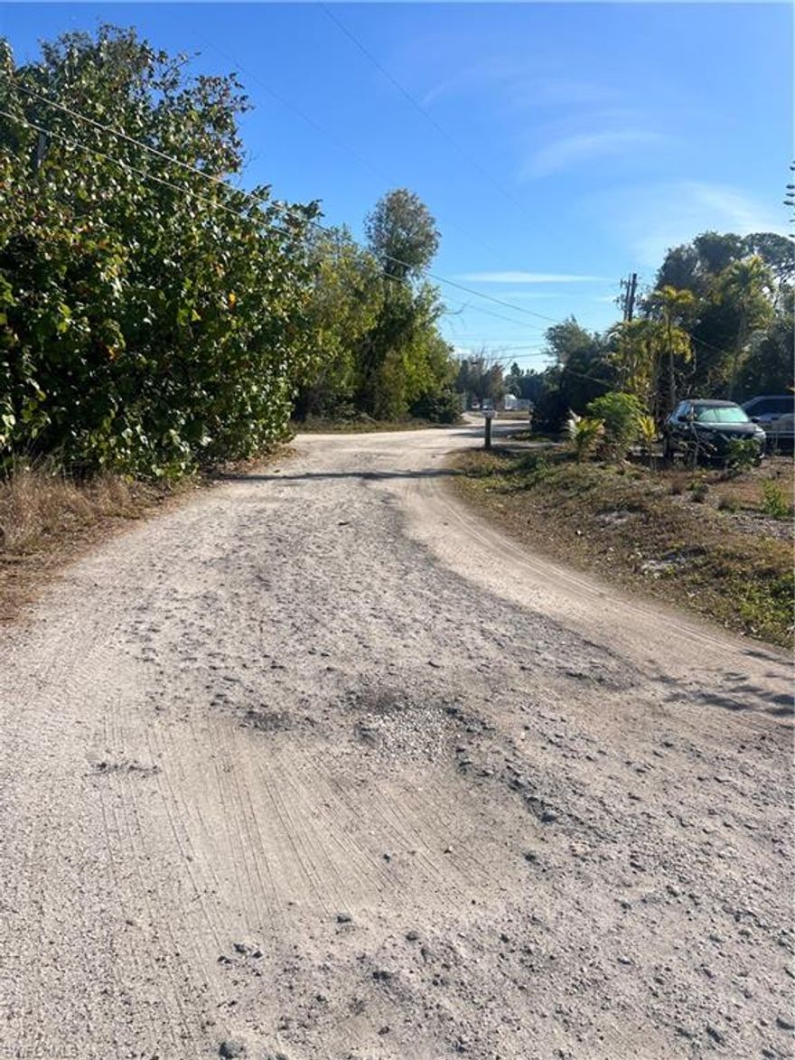 Corner Lot with CITY WATER!!!! Incredible opportunity to buy the ideal Lot to build the house of your dreams!!! Totally Clean with 0.41 sq ft. City Water already installed. In the best place in Bokeelia... Centrally located at the entrance to Pine Island, near the public library, Restaurants and Supermarkets.... In a quiet place with good neighbors. Survey available. Don't miss this opportunity to buy it.... Make your offer now.