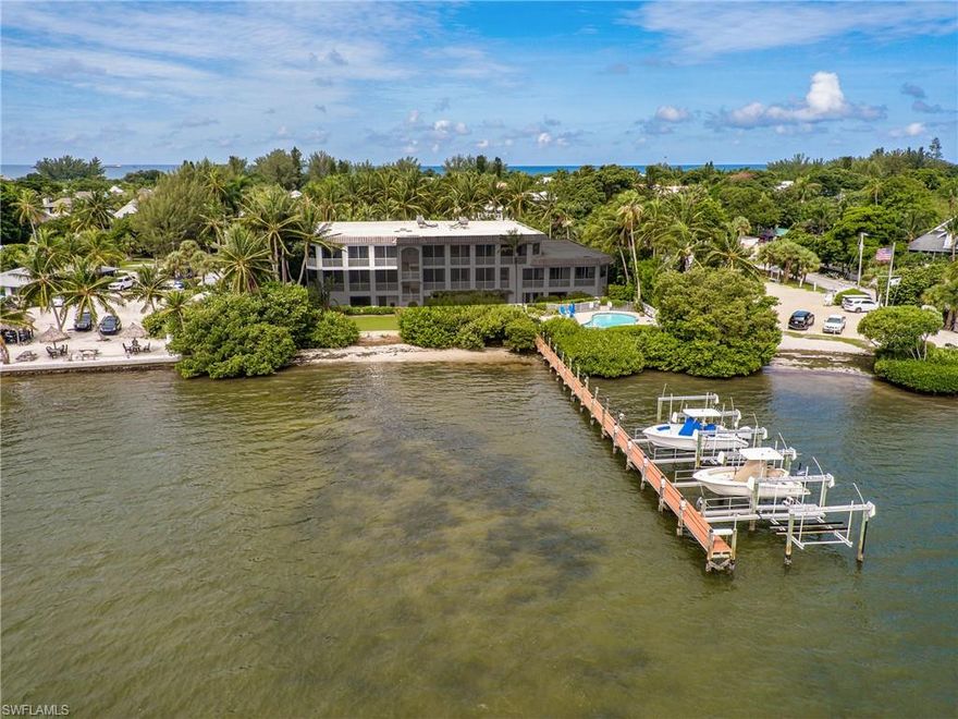 CAPTIVATING CAPTIVA BAY VILLAS!! A rare opportunity to own a penthouse condo in one of Captiva’s prestigious, low-density, and gated communities located in the heart of the Village. Step inside and witness a remarkable corner unit with panoramic bay views and offerings unlike anywhere on the island; this 3 bedroom, 3.5 bathroom condo with over 2600 living sq ft boasts towering 10ft+ ceilings, top floor sunrise views, all en-suite bedrooms, a screened patio with a gas Viking grill, and a chefs kitchen featuring: Sub-Zero appliances, custom cabinetry with pull outs, granite countertops, double electric ovens, a full size wine cooler, and beverage drawers. LIVE IT, OWN IT with your personal boat slip and lift in deep water, single car garage, and private parking spot to be able to come and go via the transportation of your choice! Captiva Bay Villas offers a pool deck and spa with easy access down your private back staircase! Don’t miss this opportunity to own Captiva’s finest!!!