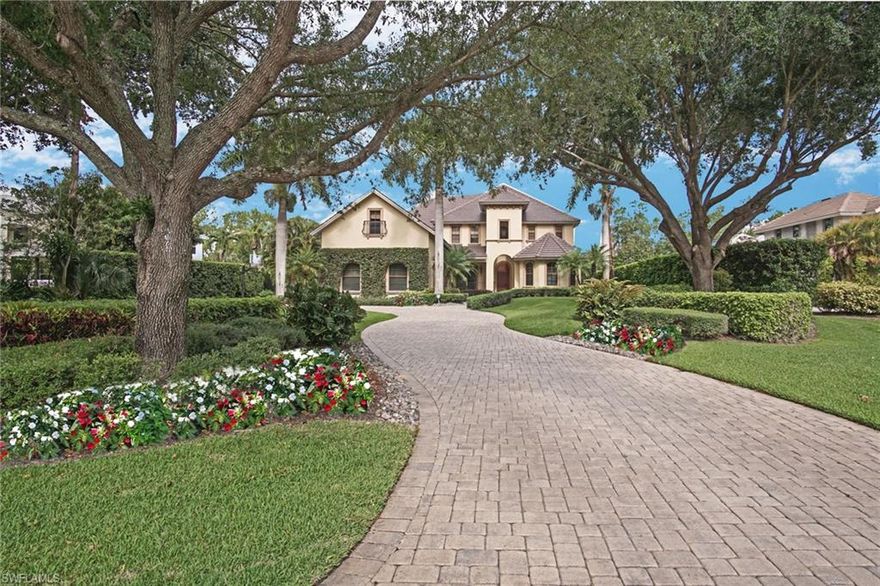 An elegant family home in a highly desirable neighborhood. This home offered an impressive 6263 AC Sq. ft, New Roof, a First Floor Master Suite, New Mechanicals, Soaring 24ft ceilings in the main living room highlighted by an entire wall of light filtering windows, center gas fireplace for added ambiance, Chef's kitchen with gas range, Monogram appliances, Granite counters. French doors that spill out onto a private outdoor space with spectacular pool/spa on a very private .83 manicured acres, complete with summer kitchen for El Fresco dining. Extra Bonus, much desired Large Theater / Game Room! This home offers built ins, wide plank flooring and a mirrored in-home gym. You will enjoy the 4 car, side loading garage with and the addition of a RV / Boat pad. Located in the highly desirable family friendly Quail Woods, the Lane is a low density neighborhood with Low HOA fees, which also include your lawn maintenance.   Zoned for the A-rated Baron Collier High school district, its home to many local Doctors and Executives with families who desire privacy and the safety of a Gated entrance. Close to all major shopping, Livingston Road and a few miles to the Sandy award winning Vanderbilt Beach. This is an amazing opportunity to make this property your own.