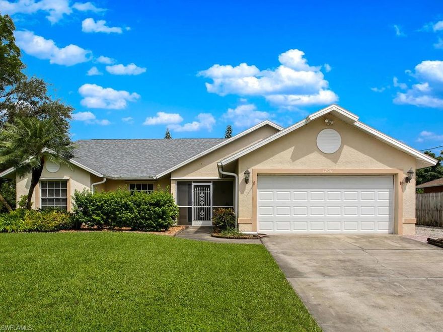 This beautiful single family home located in Golden Gate City is move in ready! This 3 bedroom 2 bath corner lot property offers plenty of yard space and backs up to a canal. This home has recently had the roof replaced as well as new plumbing throughout. The in ceiling audio speakers provide quality sound for all your entertainment needs. This gorgeous eat in kitchen comes equip with modern stainless steel appliances and granite counter tops. Sip your morning coffee and enjoy breezy afternoons in your screened in patio. This home has undeniable charm and is located in a great family community. Located near Rita Eaton Park, great for family fun and outdoor sports. Make this your new home today!