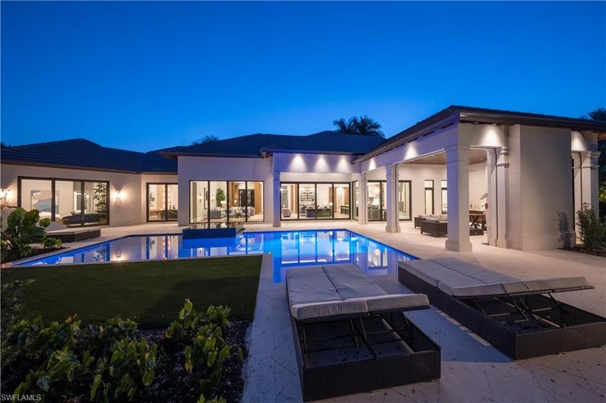 JUST COMPLETED – NEW CONSTRUCTION! Tropical, transitional ranch style home located on a cul-de-sac in the heart of the Pelican Bay Woods neighborhood. Built by BCB Homes, the one story home boasts almost 5,000 square feet of living space. Upon entering the home, you will be struck by one of the architectural focal points of the home – the beautiful entry way with soaring ceilings lines with dark teak colored wood. Your eye will move through to the statement fireplace that separates the formal living room from the great room. This spacious home with 4 bedrooms plus a den and 4 full bathrooms and 2 powders rooms is well lit from the transom windows over the front entry and the hurricane impact resistance sliding doors and opens to the backyard providing lots of natural light. Renee Gaddis Interiors has created an environment designed with a mix of clean contemporary lines with a traditional flair – perfect for entertaining. Pelican Bay’s amenities including its two private beaches situated on 3 miles of white sand beaches, state of the art fitness center and an active tennis community.