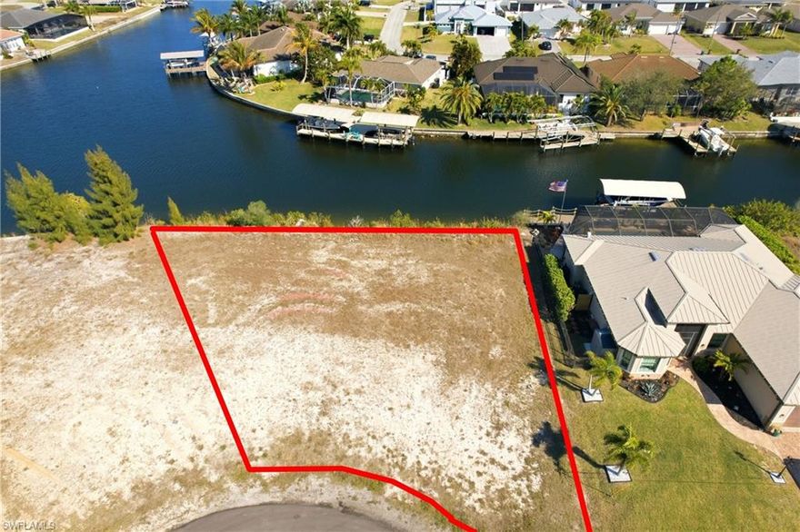 MOTIVATED SELLER!!!  Enjoy this .23-acre quiet Cul-del-sac lot with 115 feet of waterfront with expansive intersecting-canal views that creates a truly picturesque and highly desirable setting.  This exceptional homesite offers added privacy and a prime position within the canal system. Build the beautiful Florida home of your dreams, with only one bridge between your backyard and everything that southwest Florida has to offer.  This exceptional homesite offers a quick boat ride to Vibrant Matlacha and the newly approved Seven Islands development, which features' a luxury hotel, marina, restaurants and a waterfront park. This property represents a rare opportunity in one of Northwest Cape Coral's most sought-after areas.