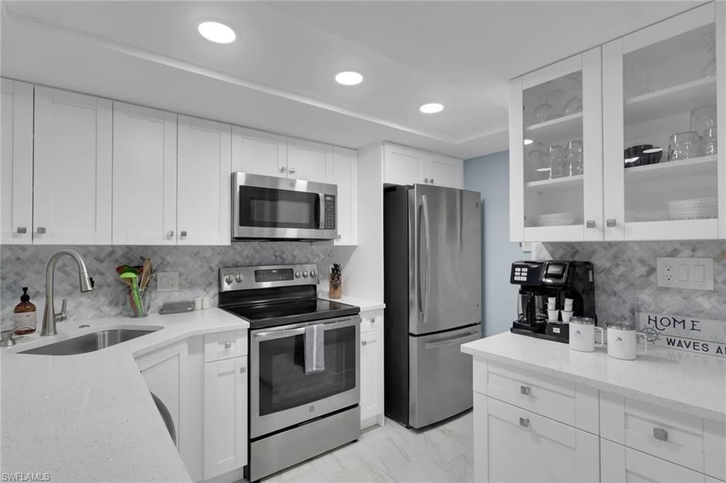 Photo of 600 Neapolitan WAY #357, NAPLES, FL 34103 (MLS # 226015932)