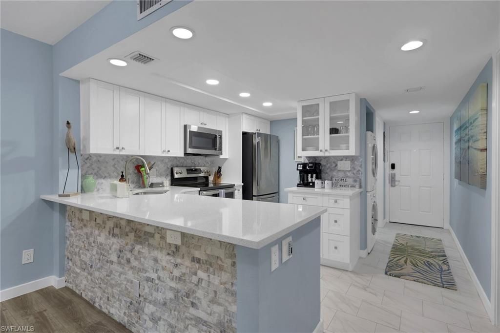 Photo of 600 Neapolitan WAY #357, NAPLES, FL 34103 (MLS # 226015932)