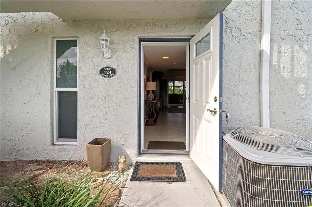 Photo of 124 Penny LN #5, NAPLES, FL 34112 (MLS # 226027878)