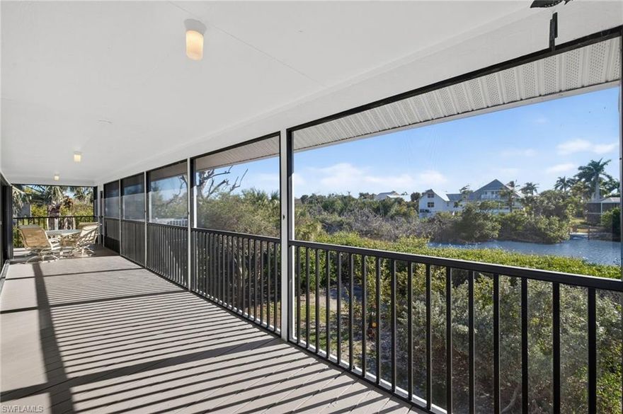 A huge screened lanai spans the full length of this lovely home and creates a tremendous amount of elevated outdoor living space. With sliders that line nearly every inch of this home's southwest exposure, the outdoor living space flows seamlessly with the indoor spaces. For years the current owners have referred to their home as their treehouse, which is entirely appropriate! Elevated and surrounded by native vegetation, a stunning array of birds, and the beautiful bayou that gives the community its name, this private, wooded home is a perfect way to be immersed in the nature of Sanibel. The house is extremely close to Bowman's Beach and its incredible shelling and to the Sanibel Recreation Center with its two pools, tennis, pickleball, and fitness opportunities. Blind Pass Beach and the restaurants and shops of Captiva are also closeby. The house has two full bedrooms with en suite bathrooms. A bunk room has been created where a laundry room was originally planned... it can easily be restored to a laundry room or continue to expand the accommodations of this charming home. A vertical platform lift at the front entry, adjacent to the 3 car garage provides fabulous convenience and accessibility. Enjoy the stunning sunsets from this incredible waterfront location and make this your treehouse at the beach!