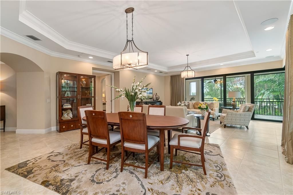 Photo of 2550 Marquesa Royale LN #8-101, NAPLES, FL 34109 (MLS # 225072998)