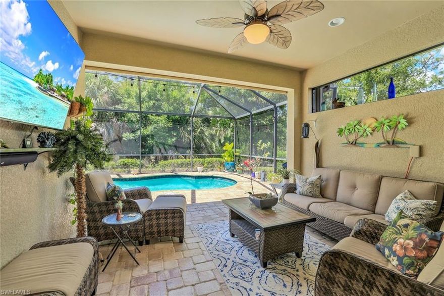 BIG PRICE REDUCTION! THIS IS ONE OF THE LOWEST PRICED VILLA POOL HOME! Discover this stunning 3-bedroom, 2-bathroom villa with a 2-car garage and a luxurious gas heated pool that is ideally situated on a premium pie-shaped lot adjacent to nature preserve and near to the vibrant Winding Cypress Amenity Center is the perfect place to make your own paradise. The flex room offers endless possibilities as a third bedroom or as a home office/den. The Serenity Model offers the perfect blend of charm and sophistication, whether you seek a year-round haven or a seasonal escape to enjoy Florida's renowned lifestyle. Indulge in effortless entertaining as the seamless open floor plan leads you to a covered lanai and expansive brick paver pool deck that gazes out onto a serene nature preserve. Witness breathtaking sunsets that paint the sky in hues of warmth while serenaded by the harmonious symphony of nature within your private screened enclosure in the prestigious Winding Cypress community. This home has features including stainless-steel appliances, elegant granite countertops, a beautifully tiled backsplash in the kitchen, and 20" ceramic tile flooring throughout the main living spaces. Noteworthy accents such as plantation shutters, rich wood flooring in the den, accordion hurricane shutters, an electric rolldown hurricane shutter at the lanai, and a host of other upscale finishes. Nestled within a secure, amenity-rich enclave, residents enjoy access to a lavish Community Center, overseen by a full-time activities’ director, offering an array of recreational facilities from card/game rooms and a library to a poolside bar and restaurant. Stay active with a state-of-the-art gym, outdoor Yoga and movement studios, group exercise classes, a resort-style pool with a dedicated lap lane, inviting fire pits, dog parks for both large and small dogs, illuminated tennis courts, pickleball and bocce courts, and sprawling lakes and nature preserves spanning nearly 800 acres, providing boundless walking and riding trails for outdoor enthusiasts. Perfectly positioned in proximity to upscale shopping, dining venues, the sandy beaches of Naples and nearby Marco Island, the ambiance of downtown Naples along 5th Avenue & 3rd Street, as well as convenient access to medical facilities, educational institutions, places of worship, I-75, RSW International Airport, and the breathtaking wonders of the Florida Everglades.