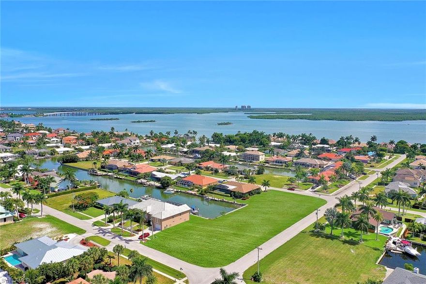 Build your dream home on this oversized, corner, waterfront lot nestled in the river area of Marco Island surrounded by beautiful houses and minutes to shops and restaurants. A boater’s delight, this water direct lot offers quick access to the Gulf through the famous and always inviting, Marco River. No bridges so you can even bring your sailboat and sail away. New seawall in 2006 and no assessments add to the value of this great lot. Paradise awaits you.