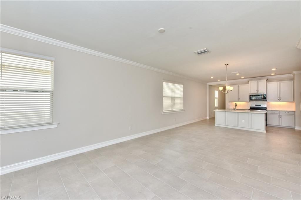 Photo of 16776 Seasons Coast DR, BONITA SPRINGS, FL 34135 (MLS # 226006434)