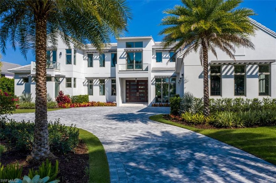 The Kingston - Completed February 2019 - Short walk to beach and Port Royal Club! A Transitional lakefront masterpiece from renowned architect Jonathan Kukk, AIA and brought to life by legendary AVA Builders with clean classic lines and warm modern tones inspired by Lisa Kahn Designs. With over 7,700 square feet under roof, the estate is ideally situated on Half Moon Lake, only steps away from the world class tennis and fitness center, and prestigious Port Royal Beach Club. Full concrete construction and high efficiency systems provide peace of mind. Luxurious living at its best offering a large master suite with his & her baths, generous guest suites and free flowing indoor-outdoor living spaces. The soaring ceilings with intricate detail and custom water features showcase the level of unique quality of this homes character. The oversized kitchen and bar areas with Wolf and Sub Zero appliances are framed by custom designed C&C cabinetry with rare stones coveted by the discerning buyer. Huge outdoor area with pool and spa sits comfortably just beyond the lake for picturesque evenings and playful days. Port Royal Club eligibility.