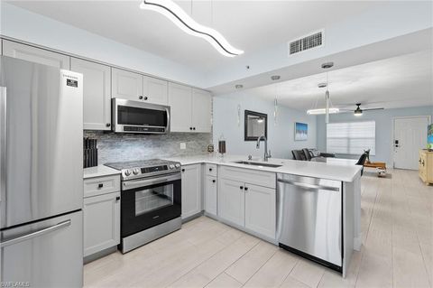 Photo of 4975 Sandra Bay DR #103, NAPLES, FL 34109 (MLS # 226017804)