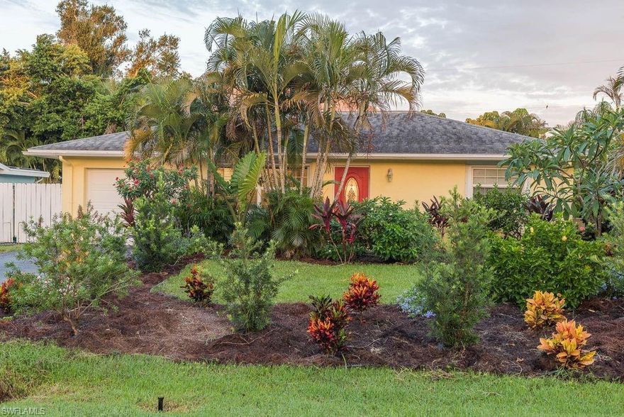 Spectacular Naples location close to 41 and Pine Ridge!  This tastefully renovated single family home is pristine and move in ready. Truly a gem is this two bedroom, one bath home with private, lushly landscaped fenced yard. So close to shopping, restaurants and minutes to the beach. The private back yard is a piece of paradise to enjoy whether sitting in your screened lanai or strolling through the tropical plantings. Morning sun from the large east windows. Beautiful golden light in the afternoons and evenings from the shaded western windows in the kitchen and dining room. Abundant natural light. Brazilian cherry living room floor. Well designed floor plan. Functional and beautiful plantation shutters in the dining room.  Custom crown molding.  Electric hurricane shutters.  Some of the recent upgrades include tumbled marble shower floor, oversized tiles in the fresh, updated bathroom. New washing machine 1 year ago. Extra hurricane damage prevention which lowers property insurance (Third Nail procedure to further secure in the roof in case of high winds).  Decent sized shed in the back yard is great for extra storage.  Roof, AC and windows are all recent.  No HOA fees!