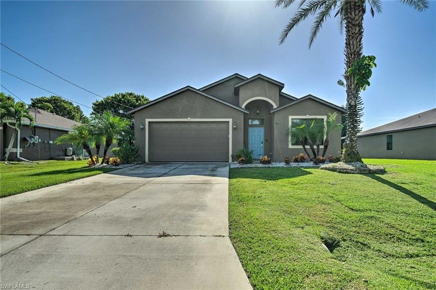Welcome to this beautifully updated Cape Coral home, where modern upgrades and pride of ownership shine throughout. Featuring all-new professionally installed luxury vinyl plank flooring (2022) and a complete interior repaint including walls and woodwork (2022), this home offers a fresh, clean, and contemporary feel from the moment you step inside. The kitchen and living spaces have been thoughtfully refreshed with updated cabinet hardware, a new kitchen faucet (2025), and a full suite of newer appliances (approx. 2021–2022). Additional interior upgrades include new door hardware throughout, a new front door, stylish ceiling fans, and added dimmer switches for enhanced ambiance. Major system improvements provide peace of mind, including a new roof (2023), new garage door opener (2026), and a pool heater (2022) to enjoy your outdoor space year-round. The screened pool area has also been improved with new screens (2023), creating the perfect setting for relaxation or entertaining. Step outside to newly refreshed landscaping (2025) with updated irrigation heads (2025), offering both beauty and efficiency. This move-in ready home combines modern updates with functional improvements, making it an exceptional opportunity in a desirable Cape Coral location. Don’t miss your chance to own a well-maintained, thoughtfully upgraded property ready for its next owner.