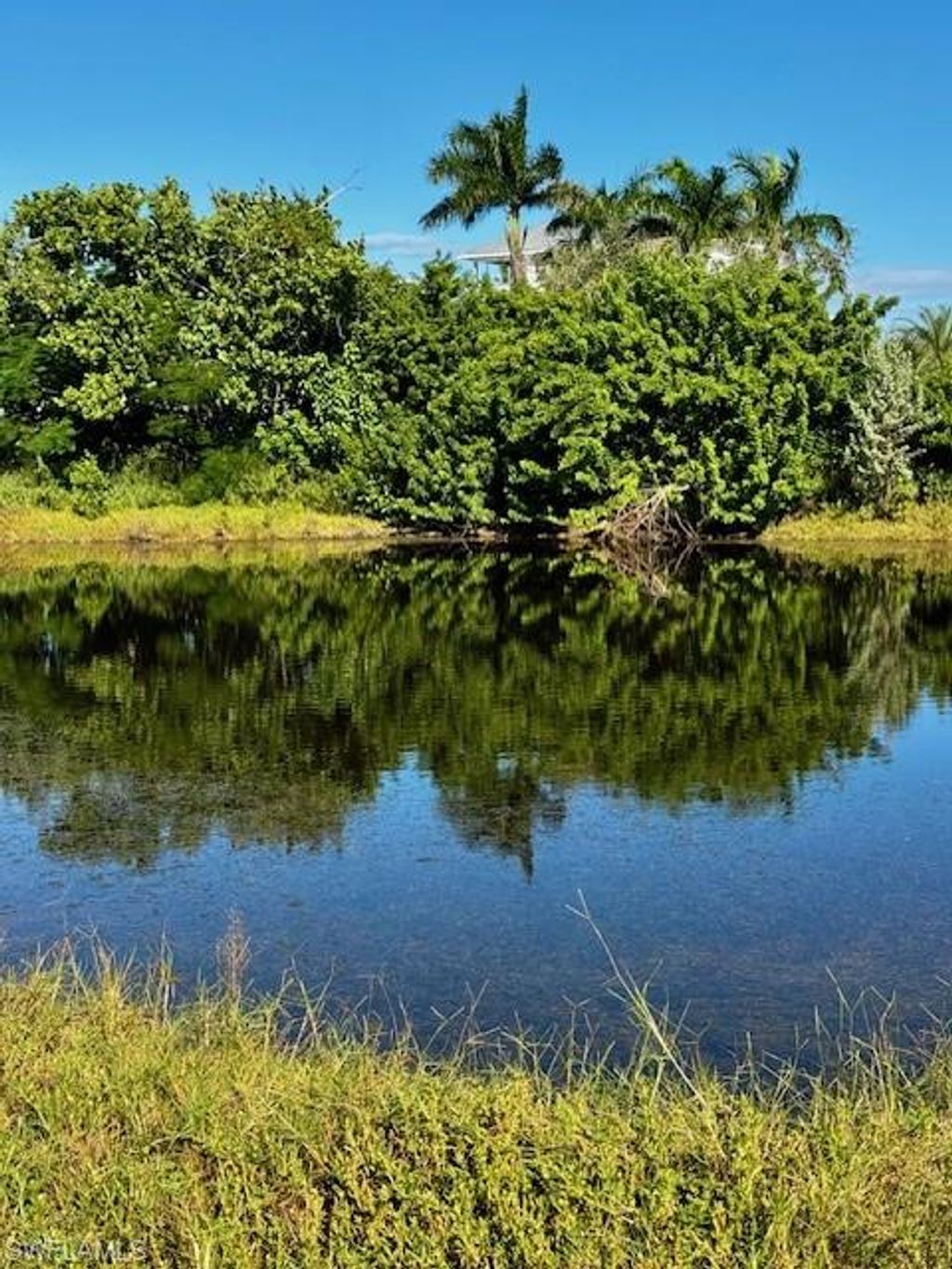 Photo of 5209 Western DR, ST. JAMES CITY, FL 33956 (MLS # 2025018270)