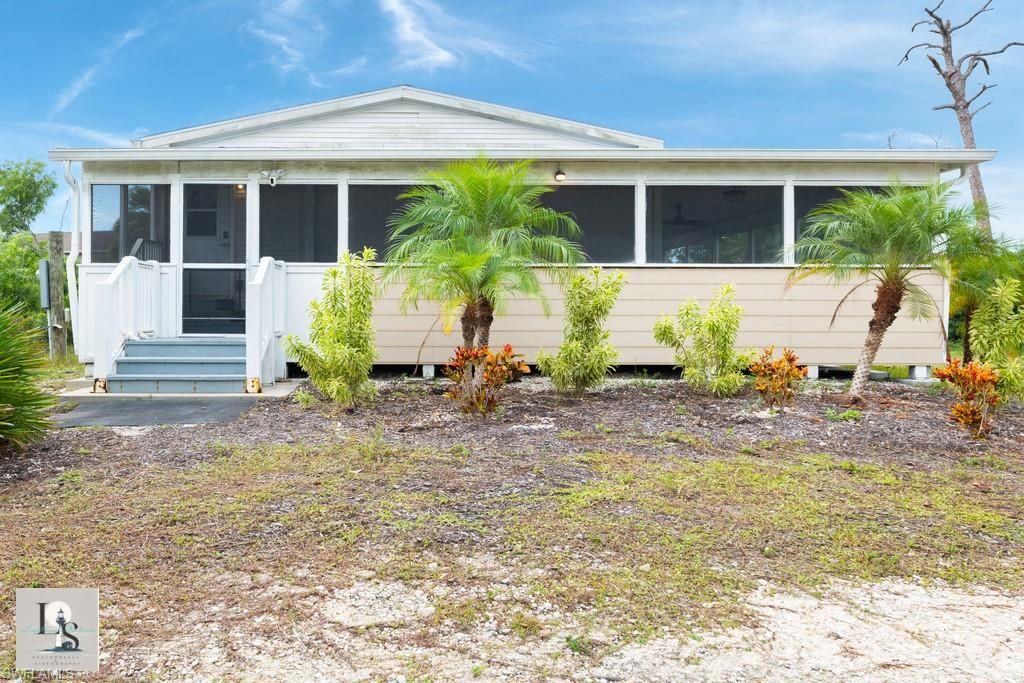 Photo of 5209 Western DR, ST. JAMES CITY, FL 33956 (MLS # 2025018270)