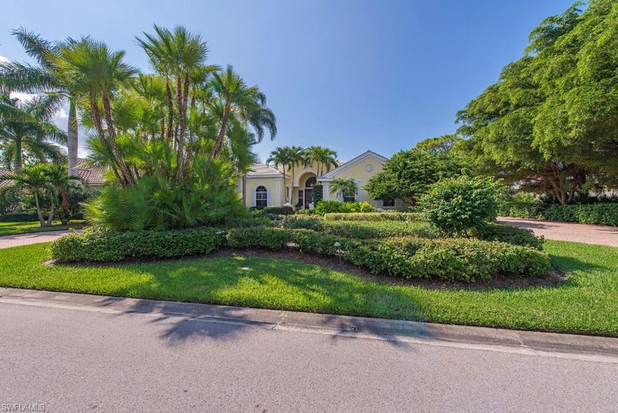 Bright and spacious custom Arthur Rutenberg estate home with fabulous upgrades and luxurious appointments throughout!  Arrive on the brick paved-circle driveway and enter through regal French Doors with decorative surround.  Upon entry, a bright open living room and formal dining room await with volume ceilings, gas fireplace, chandelier lighting, and pocket-in sliders, which open to a spectacular lanai with over 2,300 sq. ft.  With the custom pool and integrated spa as a centerpiece, the lanai is accented by architectural columns, interior landscaping, summer kitchen with built-in grill, and a lushly landscaped golf course view with ideal S exposure!  Culinary enthusiasts will surely enjoy the island kitchen with top-of-the-line Kashmire Gold granite countertops with wine rack and wine cooler.  Soak in the natural light in the gorgeous family room with Luxurious Mahogany wood flooring and built-in entertainment center with wiring for surround sound.  The den-study exudes sophistication with mahogany wood flooring, crown molding, and stunning custom built-in desk and cabinetry.   With too many more features to list, you’ll have to see it for yourself!