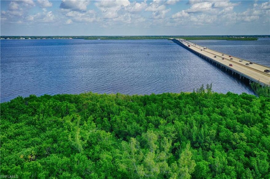 17± acres with 550' of river frontage, perfect for an estate waterfront homesite or residential development. Enjoy unobstructed river views, direct Gulf access, and two entry points on Shore Drive and Acacia Avenue. Charlotte County's Low-Density Residential land use may allow up to 85 units with a rezoning. Only minutes from Downtown Punta Gorda and I-75. One of the last large parcels with direct access on the Peace River and gorgeous views of Charlotte Harbor. Located near the new Sunseeker Resort, Fisherman's Village and other downtown attractions.