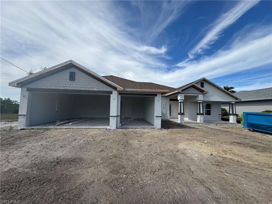 NEW concrete seawall on the Moro Canal with CITY WATER/sewer/reclaimed water & ASSESSMENTS PAID. NO FLOOD INSURANCE REQUIRED *ZONE X* ASK ABOUT INCENTIVES! NEW CONSTRUCTION = NEW ELEVATION + NEW WIND LOAD BUILD CODES + BUILDER WARRANTY! This is the Perfect 4 bedroom, 3 bathroom, 3 car garage ranch with 2265 sq ft of highly functional space on a gorgeous Canal Lot in the Heart of Cape Coral. Stone accenting with the "Craftsman" elevation + Covered Front Porch, Plank Tile & Granite Throughout, Large 23' x 8' covered lanai, - Copious Natural Lighting - Parade of Homes winner for best feature "Integrated Family Living Space" *MLS Listing Data Subject to Errors & Omissions**Price & Availability Subject to Change*