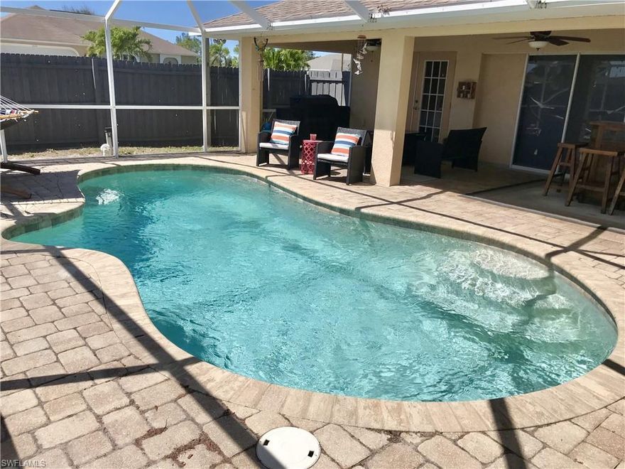 Back on the market- buyer couldn’t get financing.  NOT IN A FLOOD ZONE!  Built in 2007, this beautiful 3 bedroom, 2 & a half bath, Southern exposure POOL home sits on an oversized corner lot with 6' privacy fence. Home was freshly painted inside, new double front entry doors with Smonet fingerprint door lock & RFID card enabled, Bluetooth enabled: 3 Day Blinds, Nest Thermostat & family room ceiling fan light (Over $10K in these upgrades alone).  All 3 bedrooms feature walk-in closets.  Spacious cathedral ceilings in the great room and front living room, tray ceiling in the master. Access the pool from french doors in the master bedroom, the great room or the sliders in the living & dining room. Master bath shower was just remodeled with a new rain-glass frameless door.  You'll LOVE the kitchen with solid surface counters, real wood cabinets & a matched set of Frigidaire Gallery series self cleaning range with bake, roast, convection & air fryer settings! Let's talk about the huge screened lanai and pool deck that begs for entertaining... Pool added December 2009, 6' privacy fence 2011, water heater 2022. ORIGINAL 2007 ROOF & AC. AGENTS READ ALL COMMENTS.