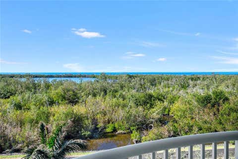 Photo of 6849 Grenadier BLVD #505, NAPLES, FL 34108 (MLS # 224096808)