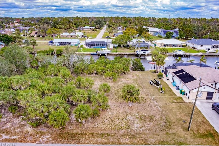 LOCATION, LOCATION, LOCATION! Privacy, beauty and ...access to the GULF! Amazing opportunity to build your dream home on this gorgeous homestead, nestled on a very desirable lot with dock and concrete seawall. Enjoy quick access to the Gulf with just one bridge to navigate! Build your waterfront home today!
