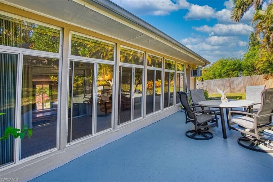 Darling Mid-century modern home that showcases clean lines, minimalist design, and a seamless blend of indoor and outdoor living. Characterized by expansive windows, open-concept spaces, and natural materials, this home emphasizes light, simplicity, and functionality. Nestled just off McGregor Boulevard, this home enjoys a prime location near the river, offering both convenience and a touch of coastal charm. Home features a whole house water filtration system including a RO system under the kitchen sink making it double filtered. A spacious, fully fenced backyard oasis with lush, mature plantings—perfect for relaxing or entertaining on the half-circle patio. A stylishly updated kitchen with sleek quartz countertops and timeless white wood cabinetry, blending modern finishes with classic appeal. Air-conditioned garage with a dedicated A/C system. The garage has a roll up screen door.  Set on a desirable street known for its collection of distinctive mid-century homes, adding character and architectural charm to the neighborhood.