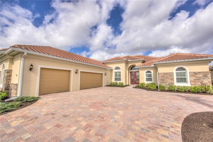 MOTIVATED SELLERS! Must see this gorgeous home in The Quarry. This Jamison model has all the upgrades. Double entry doors, beautiful Domus chiseled stone flooring, crown molding, rounded corners, wood floors in den, solid wood doors, master suite with 2 walk-in closets & custom vanity, comfort height commodes, gourmet kitchen with pull-out shelves, plantation shutters, beautiful lighting fixtures, 3 car garage with finished floors & walls, landscape lighting and all windows and doors are impact glass!  3D TV mounted on wall included, too! Located on a quiet street with limited traffic, you will enjoy privacy on your beautiful large lanai or head to the new pool-side Tiki Bar & Grill at the Lake Lodge. There is something for everyone- boating (slips available), tennis, fitness center, pickle ball, lap pool, bocce ball and golf (optional).  Why build when you can buy this for less and it looks brand new.  Rarely used, seller has not even hung pictures on walls so everything looks brand new! Easy to show!