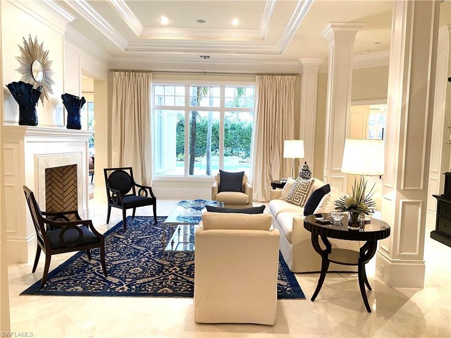 Rare perfection knocks! Downsize or Upsize to this timeless, furnished, move-in villa residing on a premium homesite with lake view in the charming Grey Oaks neighborhood of Miramonte. The over 4,100-square-foot, soft-contemporary, four-bedroom plus study, four-and-a-half-bath home designed by Lou Shafran, is in pristine condition! Included is a fully equipped kitchen with dishes, flatware and kitchen equipment, plus a spectacular stocked wet bar with glassware, wine cooler, coffee maker and icemaker.  Multiple upgrades include Wolf and Sub-Zero appliances, wide-plank white oak flooring, neutral stone floors that grace the main living areas, three-car garage, Control4 home automation system, extensive molding, sumptuous use of fabrics, breathtaking art, and a spacious covered outdoor living room with pool and spa. Minutes from downtown Naples, world-class beaches, shopping and dining, Grey Oaks Country Club offers 3 top-level golf courses, a resort pool second to none surrounded by a waterfall, firepits with seating, outdoor dining, indoor-outdoor bar, private wine lockers and an enormous multi-million dollar wellness center.