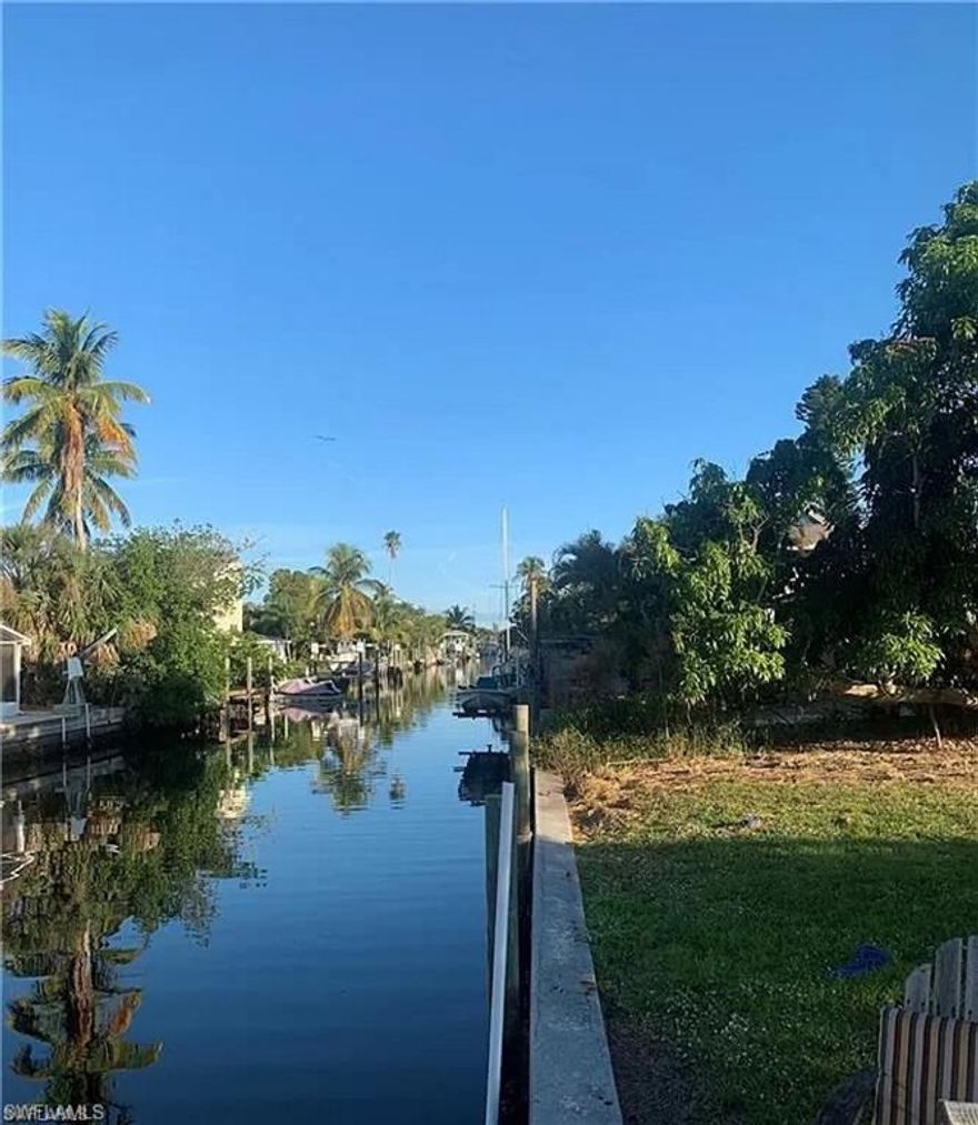 Wonderful waterfront property ready for you to build your dream home!  Property has a large, mature mango tree that produces the most wonderful mangos you have ever eaten.  The seawall is ready for you to dock your boat which can take you to some of the best fishing spots in the world.  In a matter of only a few minutes you can be in Charlotte Harbor, Pine Island Sound or the Gulf of Mexico. If you prefer to spend the day relaxing at the beach or shopping in some of the most sought after resort towns, your boat can take you to secluded, white sand beaches only minutes away or shopping and lunch at Boca Grande, Sanibel, Captiva or any number of other fabulous places to spend the day.