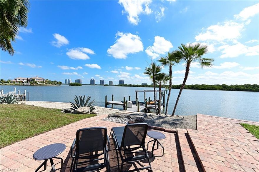 This beautiful 4 bedroom Caroland’s bay home offers the perfect Florida tropical lifestyle on nearly 1/2 acre but it’s really all about the amazing views that make you stop and look at the 180 degree, mile + long vistas of the bay. The newer oversized heated swimming pool allows for laps or relax on the large sun shelf surrounded by open decks & covered lanai right on the bay with approximately 116’ of water frontage in a very private setting. Easy walk to the beach via access across the street from the Caroland’s entrance & premier boating to the Gulf of Mexico in minutes via jet skis or boat from your private dock with lift.  This light coastal home offers one level living, an open floor plan, kitchen opens to dining & great room, great room and dining opening to covered & open lanais, volume ceilings, wide bay views from almost all rooms, large master suite w/private study, den or sitting room on the bay, 4 bedrooms, 3 baths,  concrete construction, standing seam metal roof, impact glass, electric lanai shutters, and beautiful new landscaping & sod, A well maintained home w/recent exterior paint & interior painting.  Furnishings are available for purchase for a seamless move in.