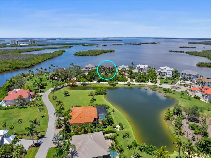One of only a handful of homes on exclusive Connie Mack Island with some of the best views in all of SWFL, this 4-bedroom Mediterranean waterfront estate offers a truly unmatched location, just minutes to Sanibel and Captiva Islands and everything this area has to offer. Set on a private, lushly landscaped, oversized estate parcel, this residence captures some of the most breathtaking panoramic water and sanctuary views in Southwest Florida. Quality concrete piling construction and attention to detail are found throughout, with a spacious floor plan, soaring ceilings, and custom cabinetry accented by marble and granite finishes. Designed for the ultimate indoor-outdoor lifestyle, enjoy a raised negative-edge pool and integrated spa, expansive deck space, multiple balconies, and a rooftop sun deck. The living areas and bedroom suites in this home are outstanding. It's a family retreat and one of the best homes that you will find to entertain and live. Enjoy quick access to the open waters, world-class fishing, and waterfront dining. The home is weather resilient with features like a NEW high-performance roof system, Impact windows and doors, and a state-of-the-art water intrusion prevention system. Other features include an outdoor kitchen, elevator for effortless access, whiskey and wine bar, game room area, and more. Boaters will love the private dock with lift, while the heated, screened pool and spa area provide year-round enjoyment. This is a rare opportunity to own on Connie Mack Island along this private stretch of only 6, where privacy, luxury, and an unbeatable location converge.