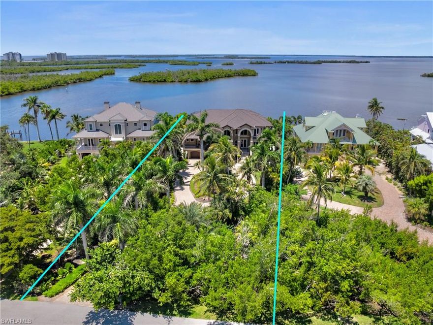 One of only a handful of homes on exclusive Connie Mack Island with some of the best views in all of SWFL, this 4-bedroom Mediterranean waterfront estate offers a truly unmatched location, just minutes to Sanibel and Captiva Islands and everything this area has to offer. Set on a private, lushly landscaped, oversized estate parcel, this residence captures some of the most breathtaking panoramic water and sanctuary views in Southwest Florida. Quality concrete piling construction and attention to detail are found throughout, with a spacious floor plan, soaring ceilings, and custom cabinetry accented by marble and granite finishes. Designed for the ultimate indoor-outdoor lifestyle, enjoy a raised negative-edge pool and integrated spa, expansive deck space, multiple balconies, and a rooftop sun deck. The living areas and bedroom suites in this home are outstanding. It's a family retreat and one of the best homes that you will find to entertain and live. Enjoy quick access to the open waters, world-class fishing, and waterfront dining. The home is weather resilient with features like a NEW high-performance roof system, Impact windows and doors, and a state-of-the-art water intrusion prevention system. Other features include an outdoor kitchen, elevator for effortless access, whiskey and wine bar, game room area, and more. Boaters will love the private dock with lift, while the heated, screened pool and spa area provide year-round enjoyment. This is a rare opportunity to own on Connie Mack Island along this private stretch of only 6, where privacy, luxury, and an unbeatable location converge.