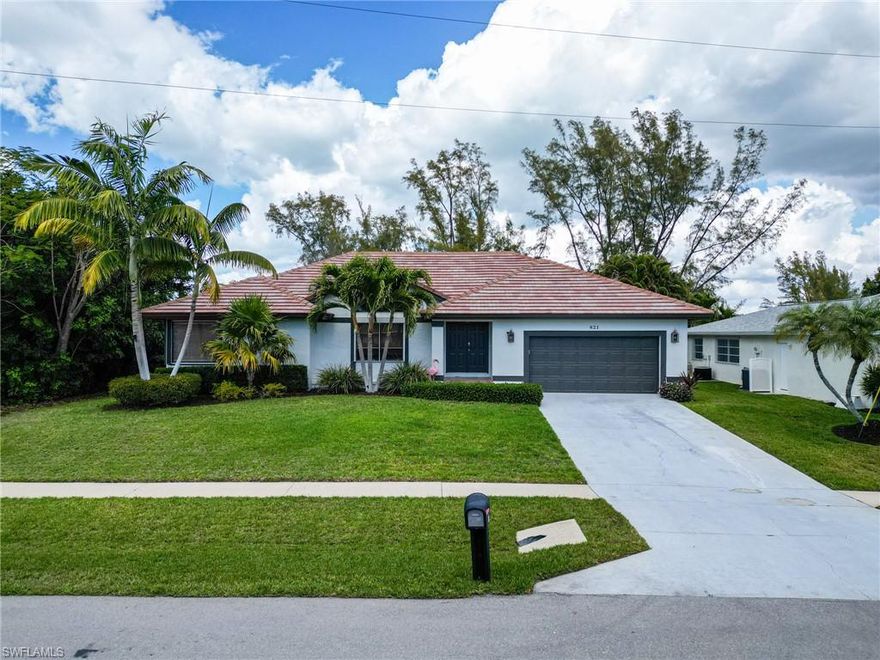 Nestled on a quiet street in Marco Island's highly sought-after Tigertail neighborhood, this beautifully renovated 3-bedroom, 2-bath pool home offers the perfect blend of privacy, comfort, and convenience. Backing up to a lush nature preserve, you'll enjoy serene views and unmatched tranquility with no neighbors behind you--just peaceful natural surroundings, while also minutes away from Marco Island's world-famous beaches.

Step inside to discover a spacious, fully furnished interior that's move-in ready. The open-concept layout is designed for modern living, newly renovated and featuring an updated kitchen with stainless steel appliances, stylish bathrooms, and tasteful finishes throughout. Generously sized bedrooms provide plenty of room for family and guests, while large windows fill the home with natural light and showcase the beauty of the surrounding landscape. Enjoy the peace of mind of a recently installed roof and hurricane protection all around.

Recent improvements further enhance the home's appeal, including a full exterior repaint, a new epoxy-coated garage floor, and a newly finished epoxy rear deck, adding durability and a clean, modern look to the outdoor living spaces.

Whether you're looking for a full-time residence, vacation home, or reliable investment property, this exceptional home checks all the boxes. Don't miss your opportunity to own a slice of paradise in one of Marco Island's premier neighborhoods.