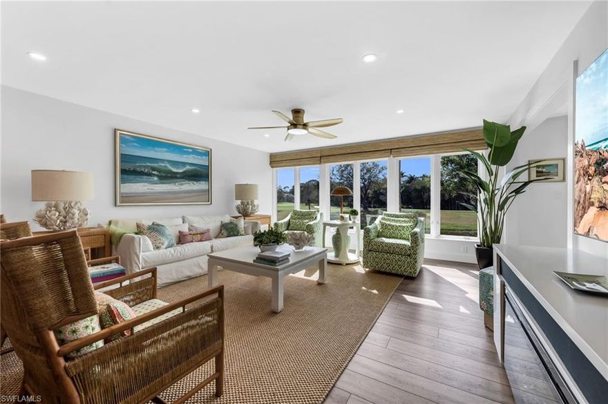 Discover the pinnacle of comfortable living in this rare second-floor 2-bedroom, 2-bathroom residence—one of only 12 units in Wilderness featuring this exclusive floor plan! Perfectly positioned with breathtaking lake-to-golf course views overlooking the 18th hole and the brand-new clubhouse, this unit offers an unbeatable location within the community. Step inside to an open, airy layout, where a wall of floor-to-ceiling windows in the enclosed Florida room seamlessly brings the outdoors in. This beautifully renovated unit features fresh paint and stunning wallpaper, and showcases a gourmet kitchen fully upgraded with quartz countertops, a stunning backsplash, custom white cabinetry with new (Notting Hill) knobs, stainless steel appliances, and a new dining room fixture. The master suite is a true retreat, with dual sinks, custom built-in cabinetry, and an oversized shower with seamless doors. Feel safe and secure with impact windows and doors, or for added privacy, new Hunter Douglas blinds with automated controllers. Residents will also enjoy access to the newly constructed, state-of-the-art 5 Star Clubhouse and practice facility, making this property the ultimate haven for golf enthusiasts. Located in an elevator building, steps away from the pool. Golf cart and cart garage with epoxy floor and cabinets for storage are included and located adjacent to your assigned covered car parking. This gated paradise is set within a 200-acre forest with stunning landscaping and mature trees overhanging roadways. It offers unlimited golf on an 18-hole Arthur Hills course, 5 pools, 4 tennis courts, bocce, croquet, and a dog park. It’s located just minutes away from charming shopping and dining at 5th Avenue and Old Naples. Purchase of a Wilderness Country Club membership is required and immediately available.