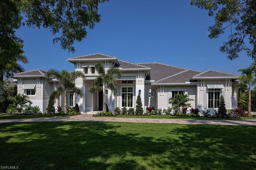 Exciting new construction opportunity with highly sought after western exposure and bountiful green space. Thoughtfully positioned on a substantial lot located on one of the most desirable tree-canopied streets in Coquina Sands. The residence, all situated on one level, with four bedrooms plus a den, was inspirationally conceived to address the needs of today’s buyer. Particular attention was paid to great room spaces with abundant light emphasizing indoor-outdoor living and entertaining. The well thought out kitchen with two islands is comprehensively equipped and serves the casual dining area, expansive covered outdoor living area and adjacent great room with ease. Three garage spaces. Conveniently located in Coquina Sands and close to the beaches of Naples and Lowdermilk Park.