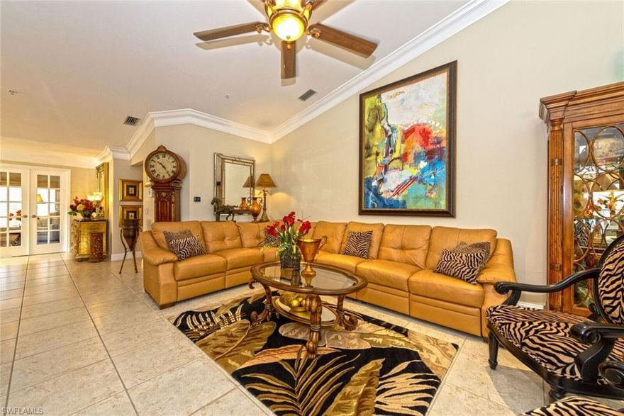 THIS ONE HAS IT ALL. Location, serenity and beautiful natural light from the water view in this lovingly cared for second floor end unit. Spacious 2 Bedroom and Den condominium (1797 sq. ft. under air) in “everything new condition” with more than $50,000.00 in improvements. Even the photographer said "this looks like Tiburon!"...Pulte construction in 2004 with too many upgrades to list.  Ask your Realtor to share the upgrade list.  This beautiful second floor condo with attached garage and extended driveway for 2 cars is easy walking distance to the clubhouse, lovely pool, workout, social rooms and school bus! Excellent Schools, Close to BEACH, I-75, shopping, restaurants and downtown. Don't miss visiting this value packed unit!!
Ceiling fans and Dining Room Austrian Shade are Excluded.