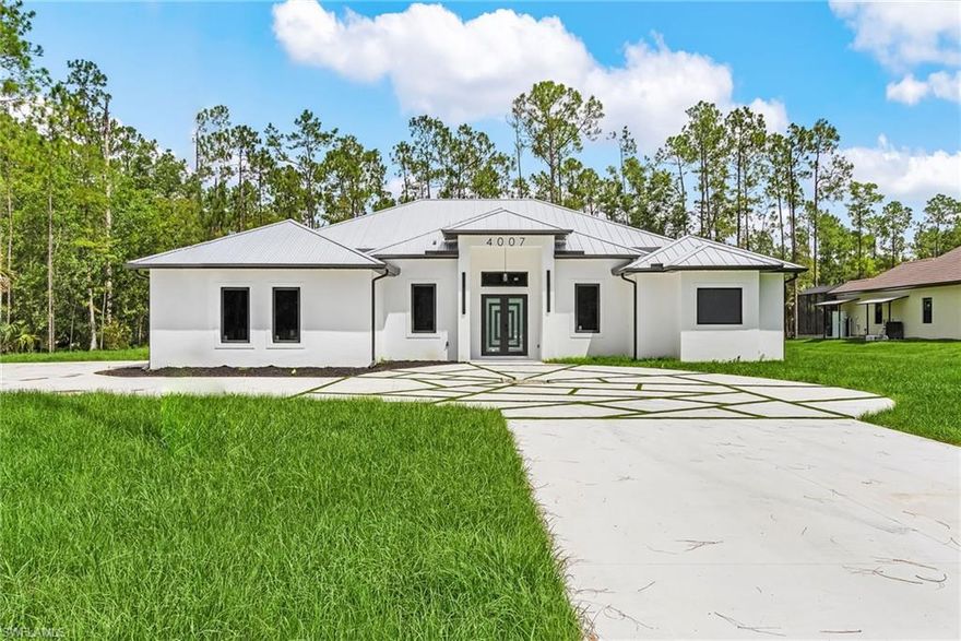 Discover your dream home in Naples! This brand-new 5 bedroom, 3.5 bath residence sits on a generous 2.4 acre lot, combining luxury, comfort, and space in perfect harmony. Step inside to find an expansive floor plan with elegant finishes throughout, designed for both everyday living and entertaining.

The gourmet kitchen is a chef’s delight, featuring top-of-the-line appliances and ample counter space, while the open-concept living areas flow seamlessly to the outdoors. Enjoy Florida living at its finest on the screened-in lanai, ideal for relaxing evenings or gatherings with friends and family.

Additional highlights include a paved driveway, sleek roof tile design for energy efficiency, and a premium reverse osmosis system for pure, refreshing water throughout the home. Every detail has been thoughtfully considered to provide a true lifestyle upgrade.

Don’t miss the opportunity to make this exceptional Naples property your own! Schedule your showing today!