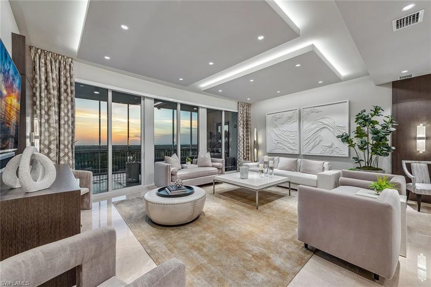 We are excited to introduce you to this exquisite residence in Aqua. This eighth-floor, three-bedroom plus den, 3 ½-half-bath, 3,940 square feet of luxurious living space has breathtaking views of the Gulf to the west and lush green views of the newly constructed Kinsale Golf Course to the east is unique in many ways. This Renee Gaddis meticulously designed residence offers an unparalleled level of luxury and elegance. No expense was spared in bringing in the finest design to afford comfort and sophistication. Enter from your private elevator and be ready to be impressed by the expanse and view of the Gulf and Wiggins Pass. The seamless flow of this residence reflects today's lifestyle. The designer spacious kitchen and wet bar has beautiful quartz countertops, top of the top-of-the-line appliances and can rightfully be called a chef’s delight. The thoughtfully designed primary suite has spectacular views of the Gulf and includes dual custom-designed closets, a spacious luxurious bath and access to the lanai. You will enjoy the privacy yet natural light of the glass-enclosed office/den offering ample space for relaxation or work. Two spacious guest bedrooms with en suites provide privacy and comfort for your family or friends. The terrace is an outdoor paradise where you can savor breathtaking sunsets, dine alfresco, or simply unwind while listening to the ocean. This home is dripping with style and finesse.  Crafted with uncompromising attention to detail, this residence was designed for the most discerning tastes. Aqua is amenity-rich including on-site concierge service, library, two spacious social rooms for casual or elegant entertaining, fitness center, spa treatment rooms, steam and dry saunas, ninth-floor level sky lounge, dog runs, large pool and a private marina. You will not be disappointed!