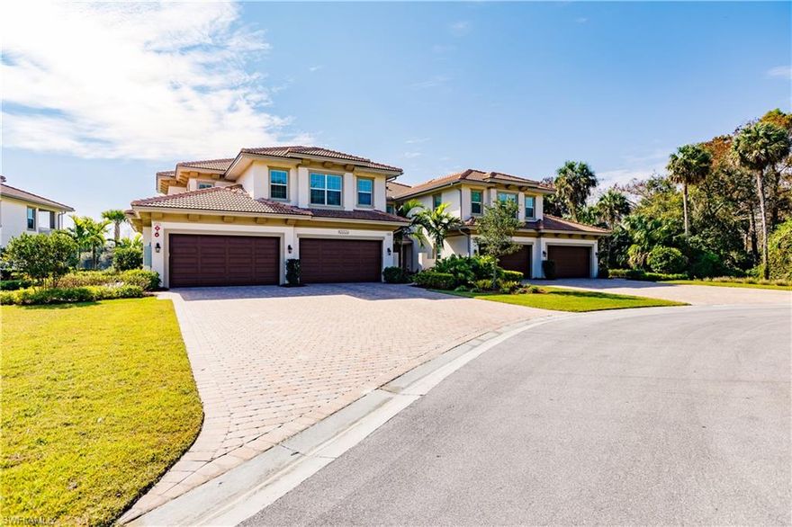Escape from the cold & stop your search, you have found a gem in your piece of paradise! It's impossible not to fall in love at first sight with this stunning top floor coach home filled with high-end finishes & fixtures around every corner. Replete with 12" x 24" grey plank tile, a remarkable quartz eat-in-island-kitchen, white shaker cabinets, double wall oven, and so much more! The openness of the great room design compounded with the Western rear exposure illuminates natural light from the pocket sliders & windows. Enjoy a cocktail on the balcony for sunsets and watch sunrays sparkle off the lake view & preserve backdrop. The double-glazed impact resistant windows & doors are energy efficient and almost soundproof! No though-traffic at the end of the cul-de-sac with an extended brick-paver driveway. The master is equipped with a king-size bed, his & her walk-in closets, dual sink vanity with quartz counter-tops, and a frameless walk-in shower & separate tub. Each bedroom has a walk-in closet & en-suite bath. The Player’s Club has unrivaled resort-style amenities including tennis, several restaurants, poolside service, chickee bar, full-service spa, social events & so much more!