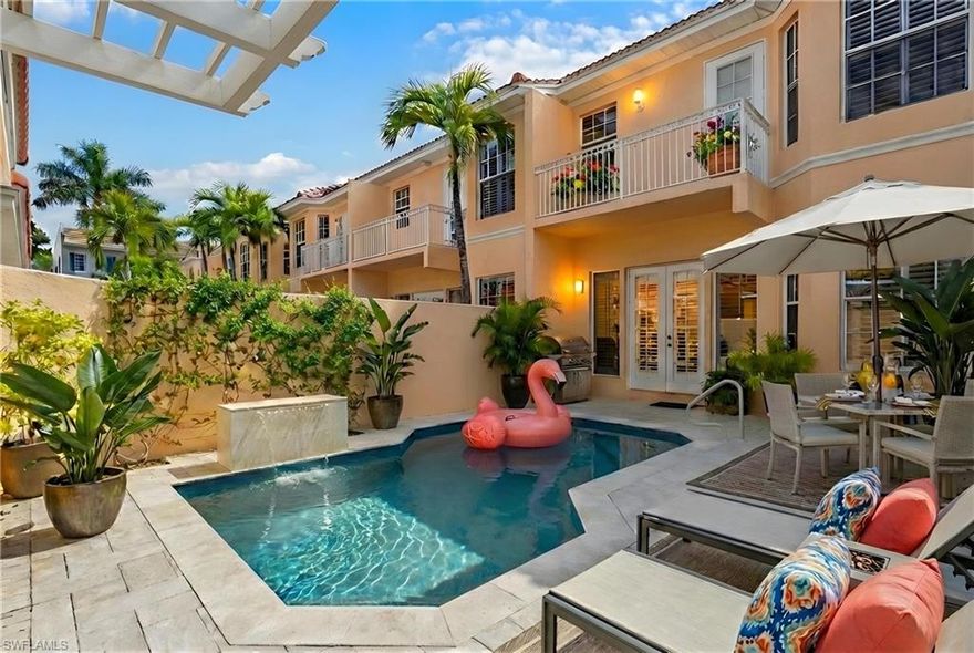 Sophisticated End-Unit Villa with Private Pool & 2-Car Garage in the Heart of Old Naples

Perfectly positioned just steps from the beach, Third Street South, and iconic 5th Avenue South, this stylish end-unit villa offers the ultimate Old Naples lifestyle within an exclusive enclave of only six residences.

Located on the desirable west end of the community, this home enjoys exceptional privacy and abundant natural light. The interior reflects a refined European aesthetic with clean architectural lines, oversized porcelain tile flooring, and a calming neutral palette throughout.

The stunning kitchen is a true centerpiece, featuring premium Miele appliances, EWE Austrian cabinetry, Brazilian quartz countertops, and a custom leather Studio Art banquette. The space flows effortlessly into the dining and living areas, creating an ideal layout for both everyday living and entertaining.

A built-in bar with a wine cooler enhances the home's entertaining appeal, while the inviting living room and adjacent sitting area provide flexible gathering spaces. Multiple balconies provide charming outdoor escapes, enhancing the home’s indoor-outdoor flow.

The spacious primary suite includes a generous dressing area and a beautifully appointed bath featuring Duravit fixtures, Hansgrohe fittings, and contemporary cabinetry. Guest bedrooms are thoughtfully positioned for comfort and privacy, each with access to well-appointed baths.

The private courtyard pool is surrounded by pretty landscaping and a tranquil water feature, creating a serene outdoor retreat rarely found at this price point in Old Naples.

Additional highlights include:
• Two-car garage with alley access
• Epoxy garage flooring
• New LAir conditioner in garage
• Impact doors and windows
• Two pets permitted

This is a rare opportunity to own a fully updated, low-density villa in one of Naples’ most walkable and desirable locations.