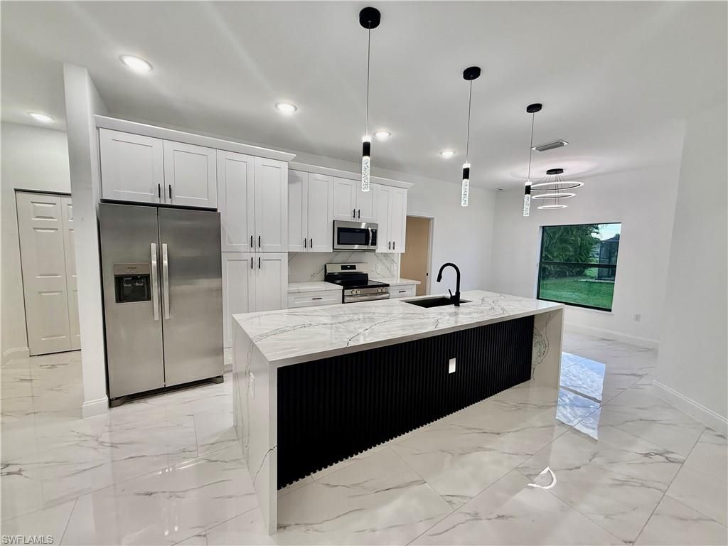 Photo of 684 Kingsbury ST E, LEHIGH ACRES, FL 33974 (MLS # 2025018341)