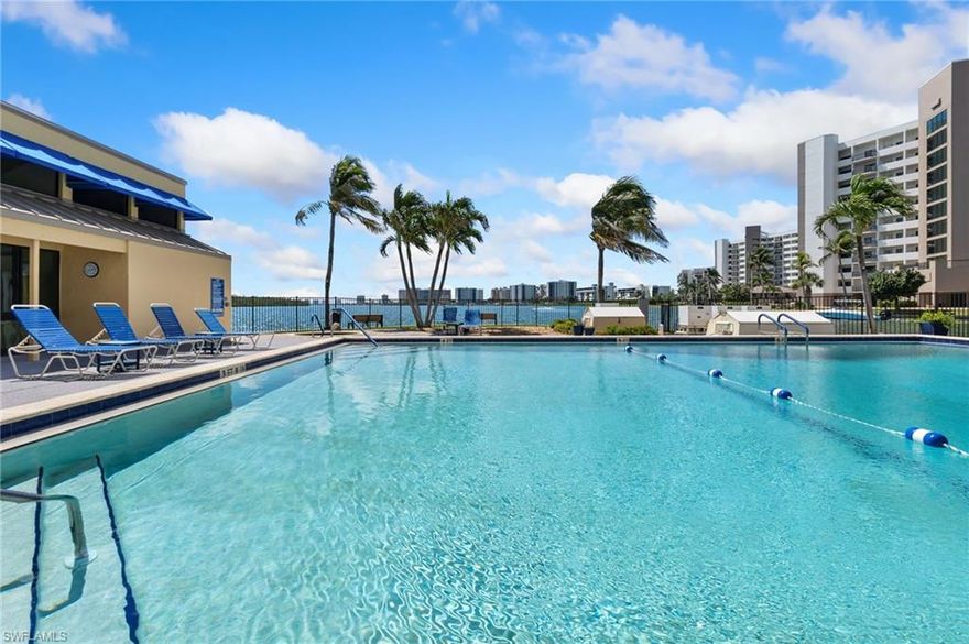 UNOBSTRUCTED WATER VIEWS GALORE! FURNISHED & READY FOR YOU TO ENJOY PARADISE NOW! Fantastic sunrises over Estero bay while you watch the boats cruise by, the dolphins & manatees play and palm trees sway. Warm breezes from the finished lanai to dine alfresco. Move In Condition" & no hurricane damage inside this unit, no assessments. Open floor plan with a coastal flair. 2 bedrooms & 2 full bathrooms. Remodeled gorgeous kitchen offers stainless steel appliances, granite counters & bar with seating. Updated HVAC system 2022, condenser 2024 & water heater 2024. Water views from front & back. Storage locker. OVERSIZED HEATED POOL & SPA in addition to the clubhouse which offers bathrooms & heated/cooled showers. Entertaining area, seating, grills, shuffleboard & waterview benches. Intersecting canal leads to the GULF, marina's, restaurants & new Margaritaville. Who needs a car when you have sidewalks & a beach/town trolley. South-end of the island feels relaxing. Only a few block from the glorious Fort Myers Beach sugar sandy beaches, CVS & the 'all new' Santini Plaza. Assigned parking & plenty of guest spots. 2 laundry rooms on each floor. Fort Myers Beach where you can enjoy the fun of Times Square, swimming, relaxing in the sun or walking the 7+/- miles of beautiful sandy beach. Not too far from Sanibel & Captiva Islands, Naples. No traffic - at the end of Lenell tucked away, but still so close to everything!