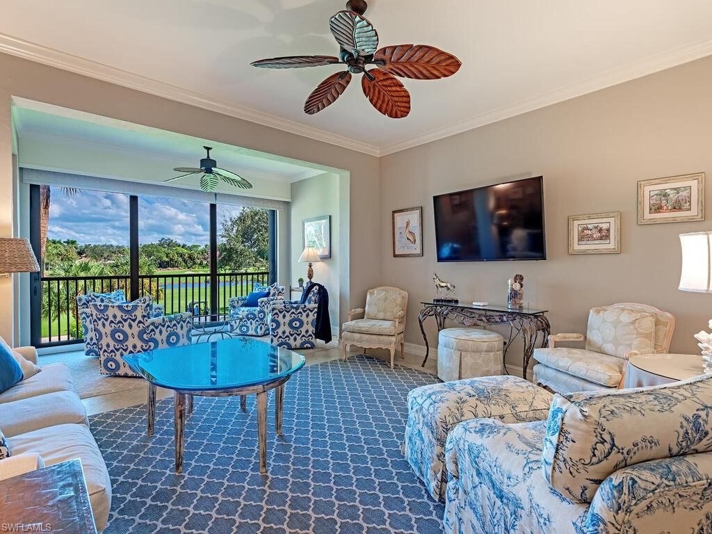 Photo of 7032 Pelican Bay BLVD #E202, NAPLES, FL 34108 (MLS # 225077763)