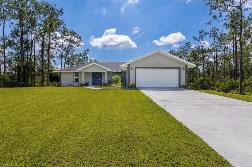 Located in Alva, Florida - built in 2021, tons of upgrades and half an acre with privacy? YOU'RE NOT GOING TO WANT TO MISS THIS ONE! The open concept floor plan with split bedrooms offers plenty of space for your family and guests. The light interior colors, white cabinetry, dark wood plank tile floors and farmhouse light fixtures is sure to make you fall in love the moment you step through the front door! The kitchen features custom cabinets with ample storage, quartz counter tops, stainless steel appliances and a walk in pantry. There is no shortage of counter space here! Enjoy meals at the kitchen island or in the dedicated dining room. The spacious master suite features dual closets, separate vanities and a large walk in shower. On the other side of the home there are two additional guest rooms and a full bathroom. Not to mention the dedicated laundry room that you're sure to be thankful for! The extended back patio is ideal for those cool summer nights where you can sit and watch the animals or kids play! There is plenty of room to run and explore! Whole house reverse osmosis system, impact windows and doors, irrigation, security system - this property checks all the boxes!